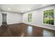 Cozy living room with great natural light and beautiful hardwood floors at 1663 Pounds Sw Rd, Stone Mountain, GA 30087