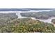 Breathtaking aerial view of a winding river flowing through a lush, wooded landscape at 408 Gray Fox Dr, Canton, GA 30114