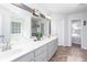 Bathroom features double vanity, neutral decor, and access to the bathtub and shower at 408 Gray Fox Dr, Canton, GA 30114