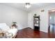 Cozy bedroom featuring hardwood floors and comfortable armchair at 408 Gray Fox Dr, Canton, GA 30114