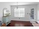 Bright dining area with pendant lighting, hardwood floors, and access to the backyard at 408 Gray Fox Dr, Canton, GA 30114