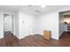 Hallway with luxury vinyl plank flooring leads to rooms with neutral walls at 408 Gray Fox Dr, Canton, GA 30114
