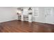Cozy living room features luxury vinyl plank flooring, built-in shelves and bright windows at 408 Gray Fox Dr, Canton, GA 30114