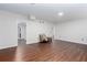 Open living room features luxury vinyl plank flooring and neutral walls, providing an open feel at 408 Gray Fox Dr, Canton, GA 30114