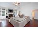 Spacious living room features vaulted ceilings, fireplace, built-in shelving, and ample natural light at 408 Gray Fox Dr, Canton, GA 30114