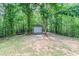 Well-maintained outbuilding surrounded by a picturesque wooded area at 408 Gray Fox Dr, Canton, GA 30114