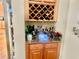 Close up view of the bar area featuring a granite countertop and custom wine storage at 5430 Lemoyne Sw Dr, Atlanta, GA 30331