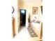 Bathroom with a large soaking tub, tiled floor, and decor at 5430 Lemoyne Sw Dr, Atlanta, GA 30331