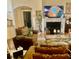 Inviting living room with fireplace, plush seating, and decorative accents creating a cozy atmosphere at 5430 Lemoyne Sw Dr, Atlanta, GA 30331