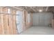 Unfinished basement with electrical and plumbing, ready for customization at 6570 Canyon Cv, Cumming, GA 30028