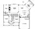 Detailed first-floor layout featuring a great room, kitchen with island, and three-car garage at 6570 Canyon Cv, Cumming, GA 30028