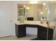 Elegant bathroom featuring a vanity with dual sinks, a walk-in shower, and tile flooring at 6570 Canyon Cv, Cumming, GA 30028