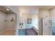 Well-lit bathroom with double vanity, soaking tub, and walk-in shower at 1278 Hollingsworth Way, Dacula, GA 30019