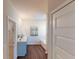 Bright bathroom boasts double vanity, hardwood floors, framed art, and separate tub and shower at 1278 Hollingsworth Way, Dacula, GA 30019