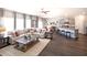 Open concept living room, kitchen and dining area with modern furnishings at 1278 Hollingsworth Way, Dacula, GA 30019