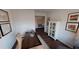 Spacious office or study featuring a desk, cabinets, and natural light at 1278 Hollingsworth Way, Dacula, GA 30019