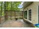 View of the home's deck, featuring a lattice panel and backyard views at 134 Waterloch Ct, Lawrenceville, GA 30043