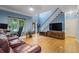 Bright and airy living area with hardwood floors and large windows at 134 Waterloch Ct, Lawrenceville, GA 30043