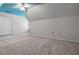 Unfurnished bedroom with blue sky painted ceiling, wall closet and carpeted flooring at 1772 Benningfield Sw Dr, Marietta, GA 30064