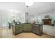 Open kitchen design with island sink, blending seamlessly into a dining area and living space for modern living at 1772 Benningfield Sw Dr, Marietta, GA 30064