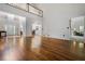 Open-concept living room with hardwood floors and high ceilings at 1772 Benningfield Sw Dr, Marietta, GA 30064