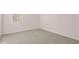 Bedroom with carpet, a window with blinds, and neutral color walls at 1940 Van Allen Ct, Dacula, GA 30019