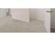 This bedroom features neutral carpet and white trim with doors at 1940 Van Allen Ct, Dacula, GA 30019