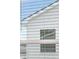 View of neighborhood through window with blinds at 1940 Van Allen Ct, Dacula, GA 30019