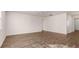 Spacious open living area showcasing wood flooring and neutral paint at 1940 Van Allen Ct, Dacula, GA 30019