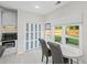 Bright dining area with sliding doors to the backyard and lots of natural light at 2261 Seatton Ct, Marietta, GA 30062