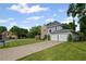 Well-maintained home with a long driveway, attached two car garage, and manicured lawn at 2261 Seatton Ct, Marietta, GA 30062