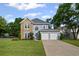 Charming two-story home featuring a stone facade and a two-car attached garage at 2261 Seatton Ct, Marietta, GA 30062