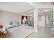 Spacious living room with open dining area, neutral carpet, and bright natural light at 2261 Seatton Ct, Marietta, GA 30062