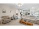 Open concept living room showcasing plush seating and open flow to kitchen and dining at 2261 Seatton Ct, Marietta, GA 30062