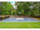Backyard basketball court, perfect for recreation and sports at 6610 Major Dr, Cumming, GA 30040