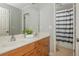 Bathroom with double sinks and a separate water closet at 6610 Major Dr, Cumming, GA 30040