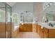 Bright primary bath with a separate shower and bathtub at 6610 Major Dr, Cumming, GA 30040
