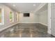 Spacious living room with recessed lighting and multiple windows for natural light at 6610 Major Dr, Cumming, GA 30040