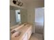 Bathroom featuring a double sink vanity with white cabinets at 753 Hayes Ct, Atlanta, GA 30349