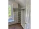 Walk-in closet with custom shelves and drawers at 753 Hayes Ct, Atlanta, GA 30349