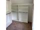 Spacious closet features ample shelving and hanging space for organized storage at 753 Hayes Ct, Atlanta, GA 30349