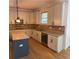 Bright kitchen with updated appliances, island, and modern backsplash at 753 Hayes Ct, Atlanta, GA 30349