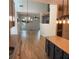 Open-concept layout showcases the kitchen, living room, and hardwood flooring throughout the home at 753 Hayes Ct, Atlanta, GA 30349