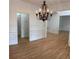 Open living room featuring beautiful hardwood floors and elegant trim work at 753 Hayes Ct, Atlanta, GA 30349