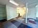 Unfinished basement with a door to the kitchen and staircase to the upper floor at 942 Batesville Rd, Canton, GA 30115