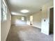Expansive bedroom with neutral walls, carpet, and multiple windows for natural light at 942 Batesville Rd, Canton, GA 30115