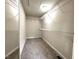 Spacious walk-in closet with ample shelving and room for organization at 942 Batesville Rd, Canton, GA 30115