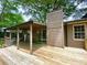 Spacious wooden deck perfect for outdoor gatherings and relaxation at 942 Batesville Rd, Canton, GA 30115