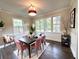 Inviting dining room filled with natural light, perfect for hosting gatherings at 942 Batesville Rd, Canton, GA 30115