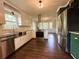Bright and airy kitchen with stainless steel appliances and granite countertops at 942 Batesville Rd, Canton, GA 30115